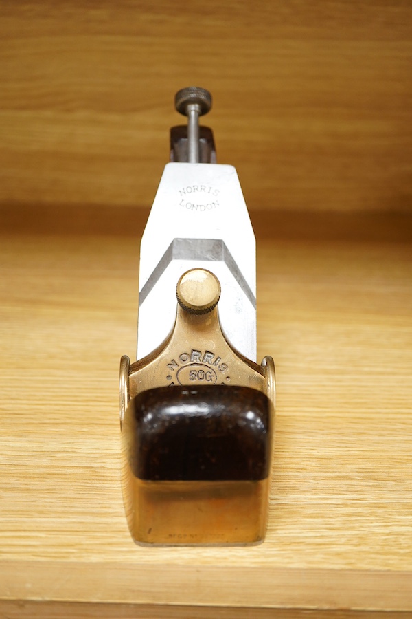 A Norris 50G adjustable gunmetal, steel soled smoothing plane, stamped with Norris, London to both the brass lever cap and the iron, with owner’s name stamped to the handle